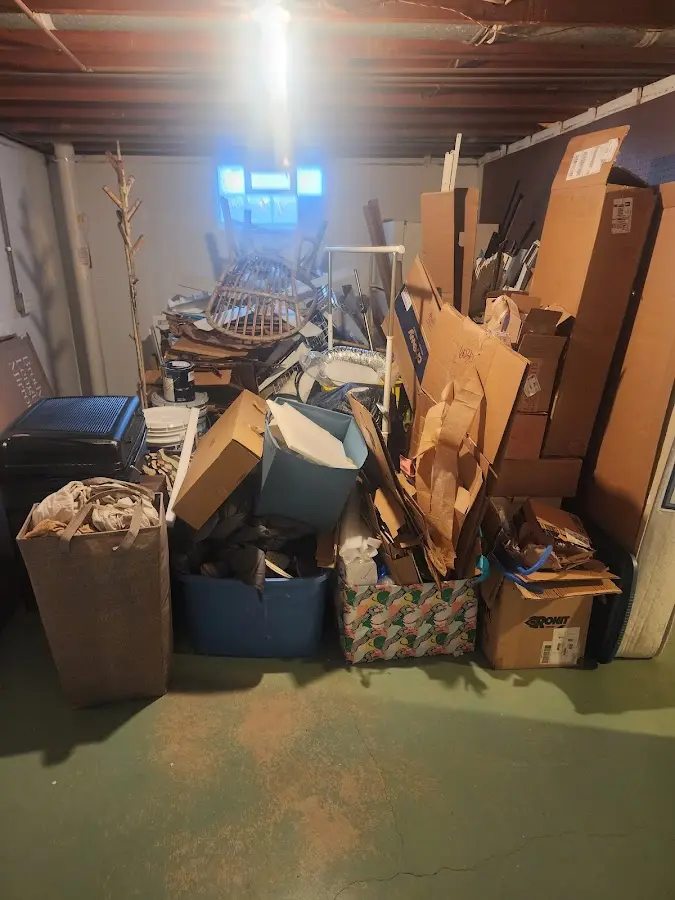 Roll-off dumpster container at job site for 15 Yard Dumpster Rental in Derby